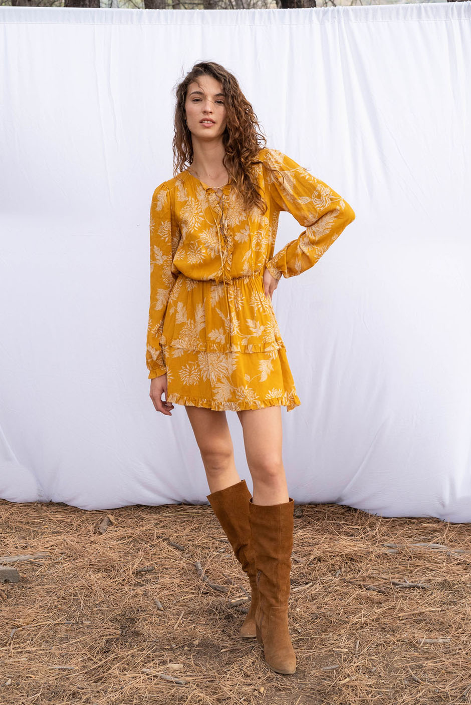 Florance mini dress in Golden Toile print for women by Paneros Clothing. Elastic waist with a flowy fit, and lace-up front from deadstock rayon fabric. Front View.