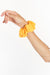 Babe scrunchie for women by Paneros Clothing. Mango colored in 100% Rayon from sustainable leftover fabric.