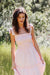Paneros Clothing - Sustainable Fashion Ethical Designer Pink Maxi Smocked Dress for Women - Lifestyle Image.