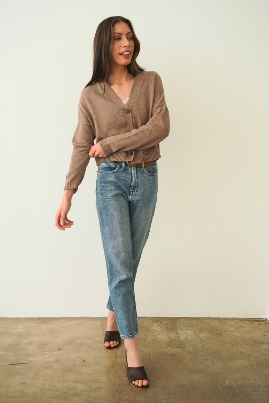 Mocha Brown sustainable cropped-length Cotton Diana Cardigan from Paneros Clothing with real coconut shell button-up front, Full sleeves, and feminine handknittting. Front View buttoned.