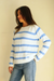 Baby Blue and White Striped sustainable cotton handknitted Sloane Crewneck by Paneros Clothing. Relaxed-fit hip-length crewneck sweater with long sleeves and ribbing details. Front/Side View.