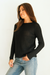 Black sustainable cotton handknitted Openwork Sloane Crewneck by Paneros Clothing. Relaxed-fit hip-length crochet crewneck sweater with long sleeves and ribbing details. Side View.