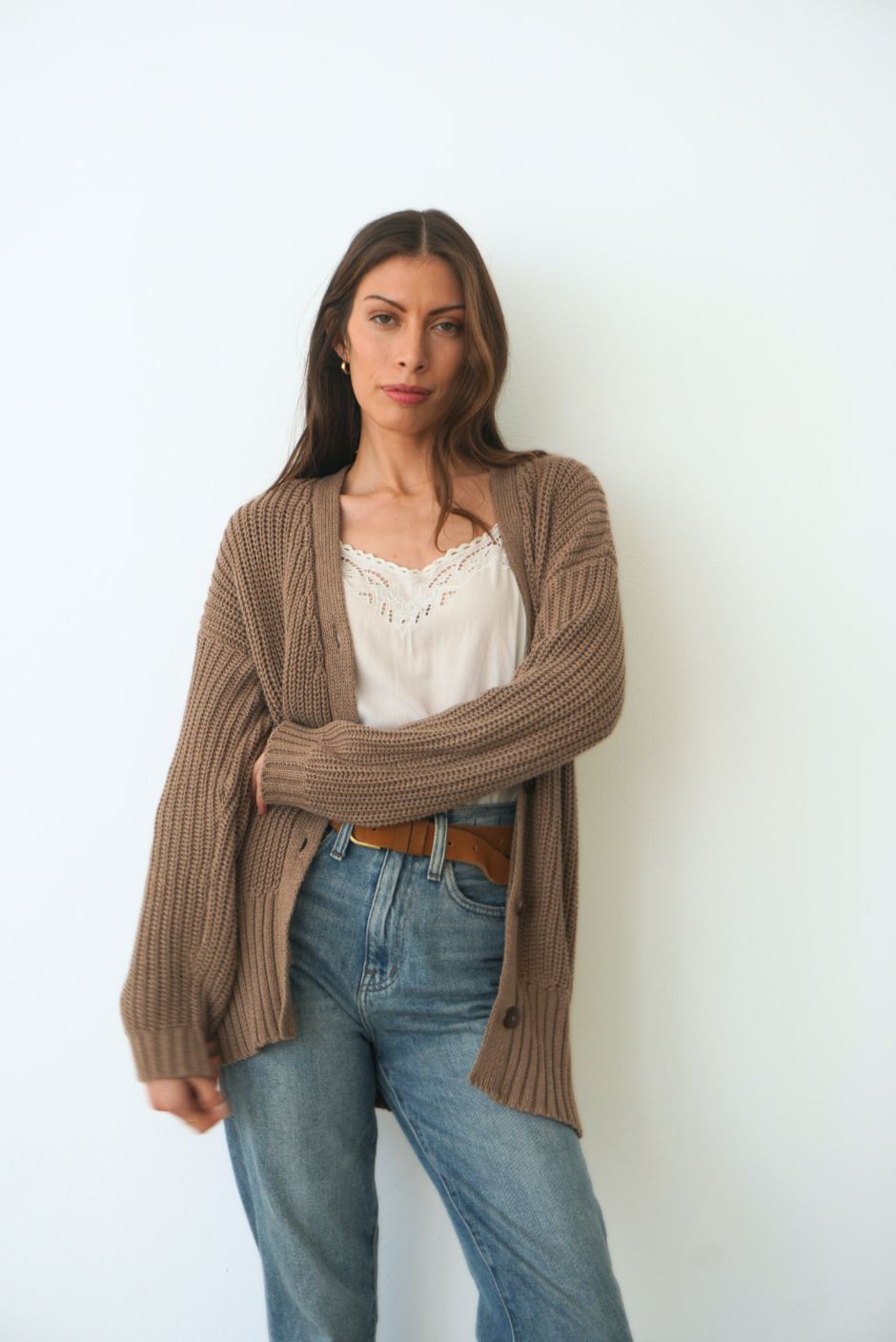 Mocha Brown Sustainable Cotton Hip-Length Button-up Emily Cardigan by Paneros Clothing. Hand-knitted, slightly oversized cardigan with real coconut shell buttons and ribbed detailing. Front View unbuttoned.