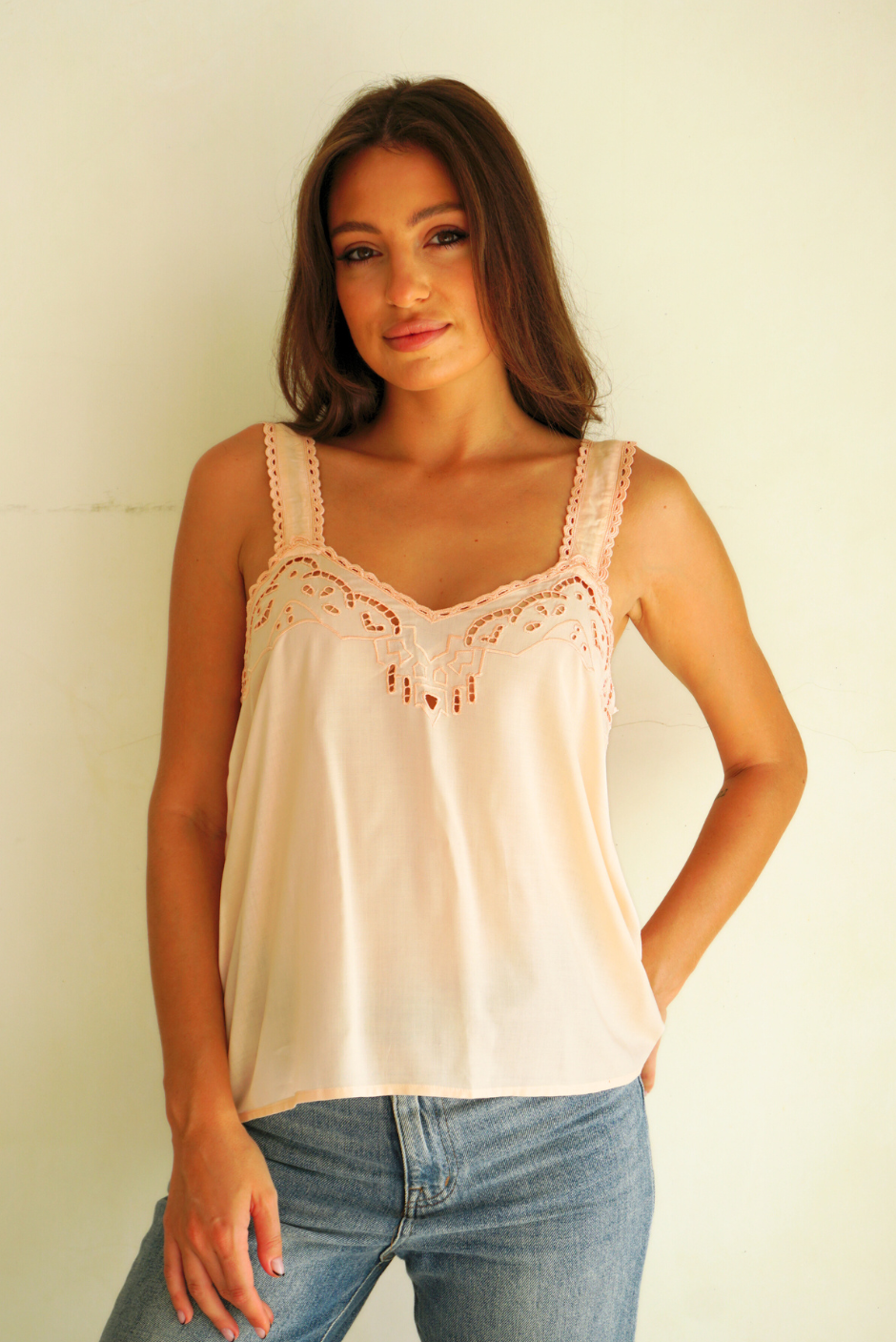 Peachy Pink Iris Camisole Tank-Top for Women with Embroidery detail and wide straps from Paneros Clothing. Front View untucked.