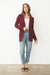 Burgundy Sustainable Cotton Hip-Length Button-up Emily Cardigan by Paneros Clothing. Hand-knitted, slightly oversized cardigan with real coconut shell buttons and ribbed detailing. Front View unbuttoned.