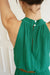 Emerald Green Sustainable Maxi Dress from Paneros Clothing: the Gia. Halter neckline, elastic at the waist, with ruffles.  Back View showing the buttons and removable belt.