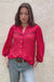 Red Sedona Tile Print Anna Shirt from Paneros Clothing with button-up front and long sleeves. Sustainable rayon dobby shirt blouse in red sedona tile print with contrast navy piping details. Detailed Full Body View tucked into denim.