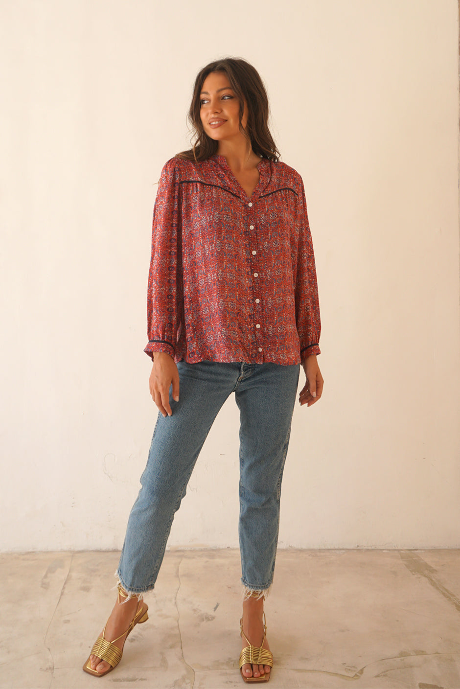 Red Boho Print Spring/Summer 2023 Anna Shirt from Paneros Clothing with button-up front and long sleeves. Front View untucked.