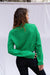 Diana cropped Cardigan in Emerald Green color for women by Paneros Clothing. Handknitted from sustainable deadstock cotton yarn, with full sleeves and vintage crystal buttons. Back view.