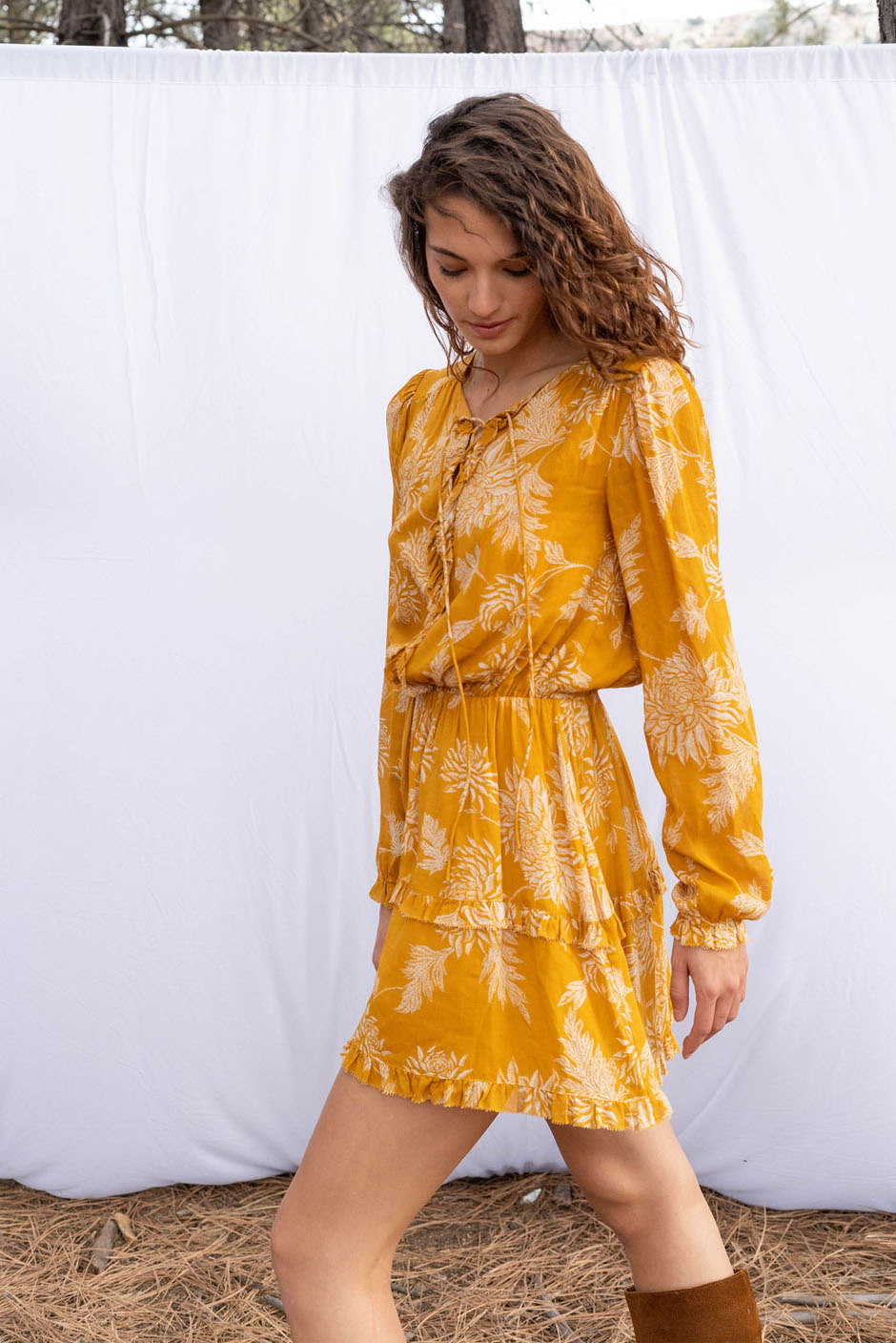 Florance mini dress in Golden Toile print for women by Paneros Clothing. Elastic waist with a flowy fit, and lace-up front from deadstock rayon fabric.  Side View.