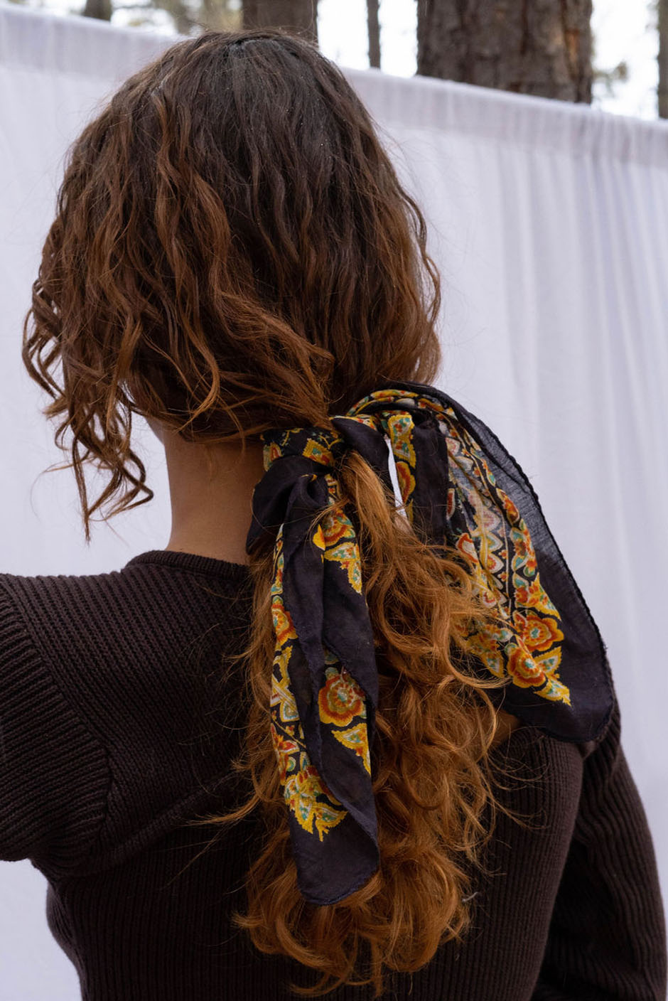 Vintage Freya bandana in Noir handcrafted in India Featuring a multicolor paisley print for women by Panero Clothing. Hair tied view.