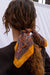 Vintage Freya bandana in Tumeric Gold handcrafted in India Featuring a multicolor paisley print for women by Panero Clothing. Hair tied view.