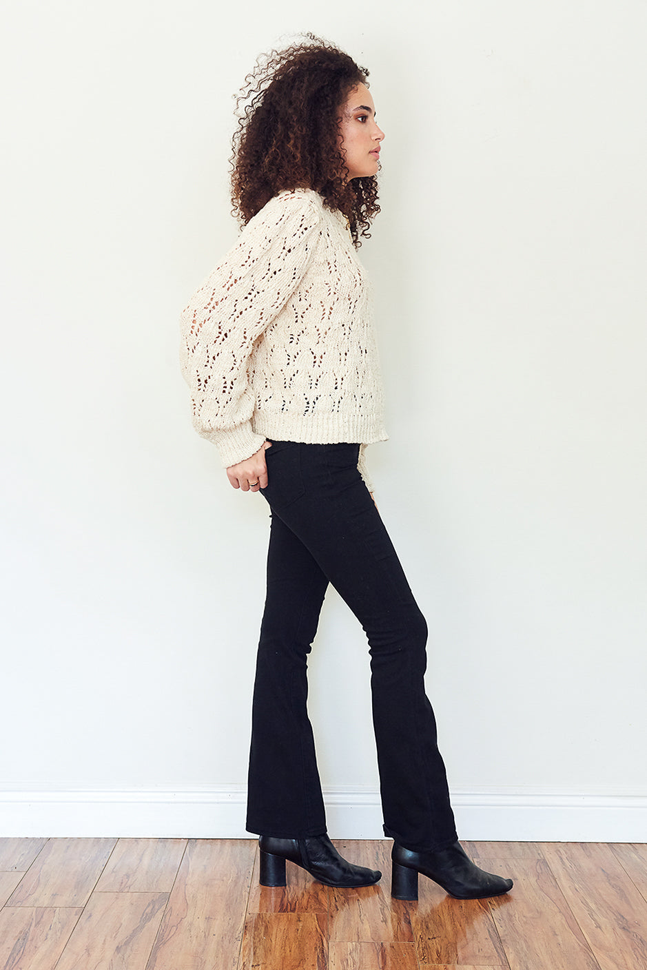 Hazel knit sweater for women by Paneros Clothing. Popover style, openwork pointelle design from organic cotton.  Side View.