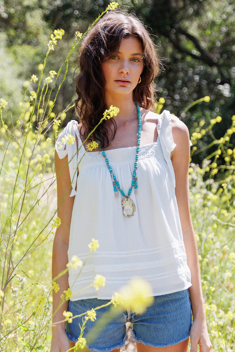 Paneros Clothing - Sustainable Fashion Ethical Designer White Tank Top for Women - Lifestyle View.