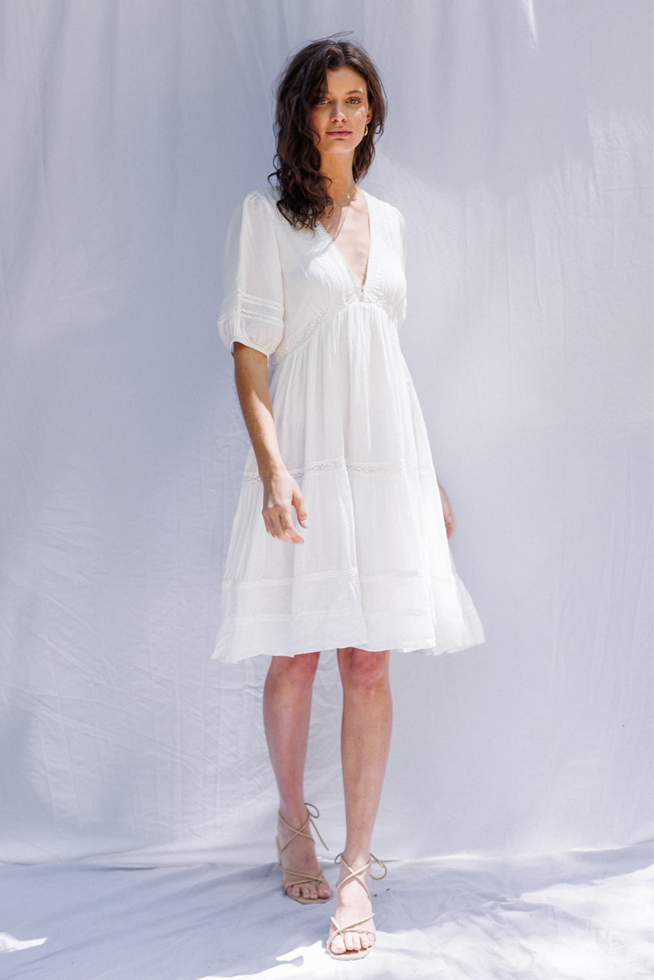 Paneros Clothing - Sustainable Fashion Ethical Designer White Mini Dress for Women - Side View.