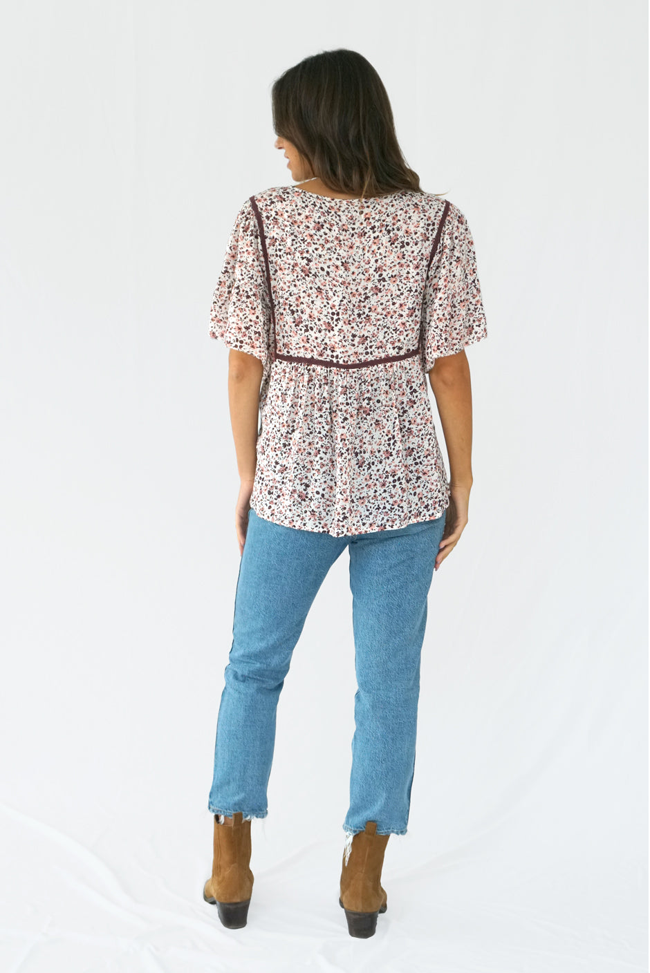 Floral Print Short Sleeve Women's Maya Flutter Top from Paneros Clothing with 100% certified sustainable fabric and piping. Back View.