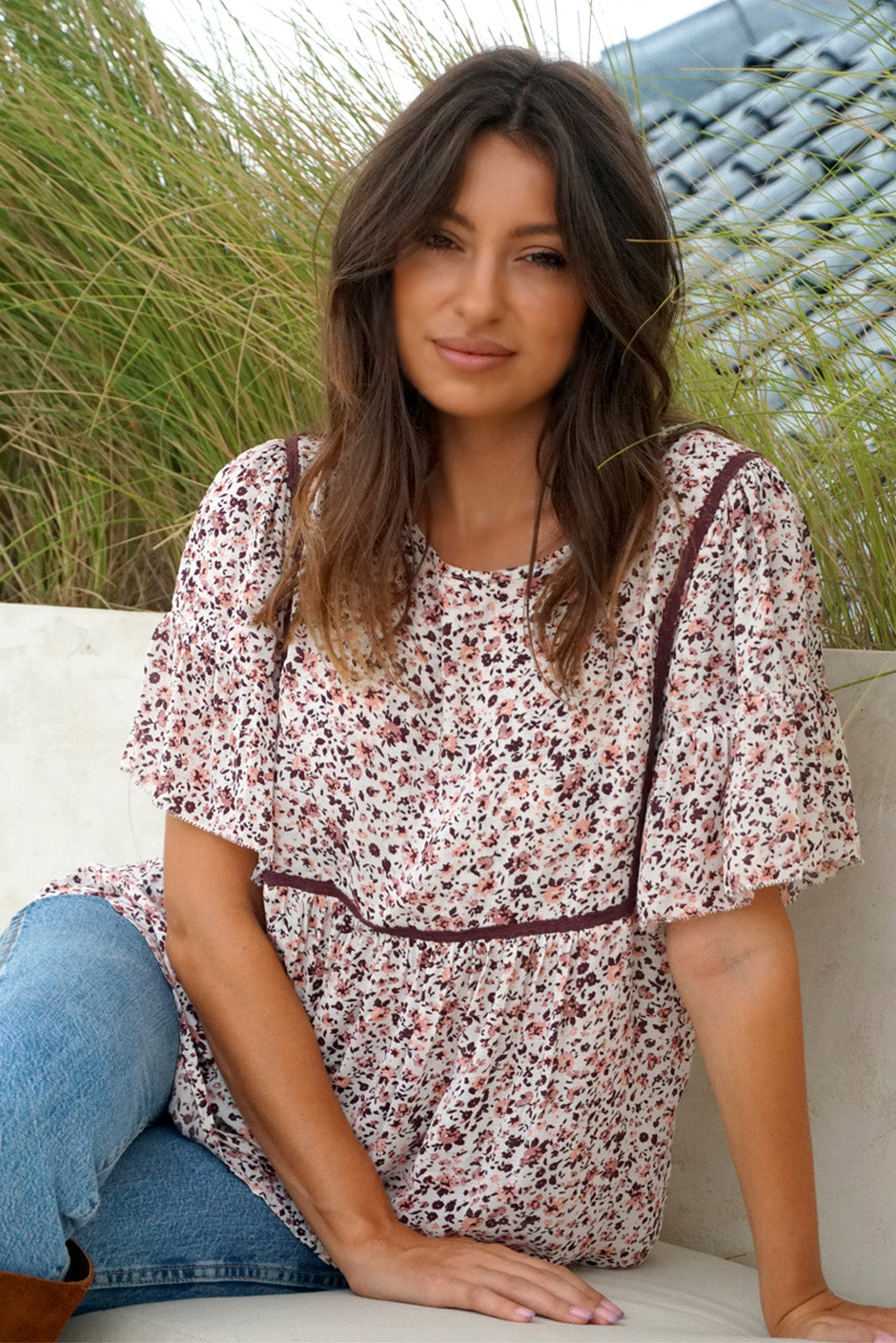 Floral Print Short Sleeve Women&#39;s Maya Flutter Top from Paneros Clothing with 100% certified sustainable fabric and piping. Front View.