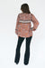 Bohemian Brown Floral Print Long Sleeve Women's Sierra Blouse Top from Paneros Clothing with 100% certified sustainable fabric and contrast black binding & open neck. Back View.