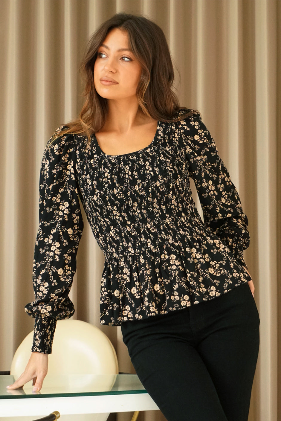 Floral Print Long Sleeve Women&#39;s Stella Blouse from Paneros Clothing with 100% certified sustainable fabric and smocking. Front View.