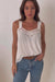 White Iris Camisole Tank-Top for Women with Embroidery detail and wide straps from Paneros Clothing. Detailed Full Body View in motion.