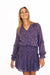 Purple Boho Print Spring/Summer 2022 Aria Blouse from Paneros Clothing with V-neckline and long sleeves. Front View tucked into Skirt.