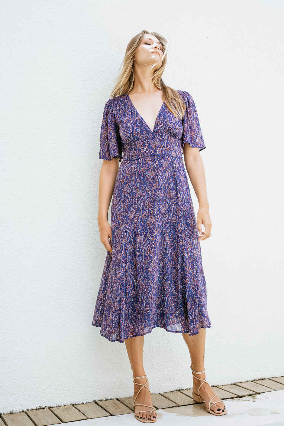Purple Boho Print Spring/Summer 2022 Aurora Midi Dress from Paneros Clothing with V-neckline and mid sleeves and Piping detail. Front View.